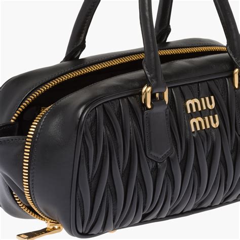 miu miu matelasse bauletto bag|Matelassé nappa leather handbag Black .